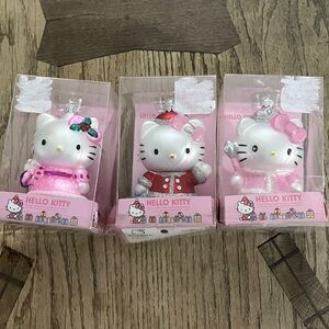 Hello Kitty Trio with Pink and Red Outfits. Glass Christmas Ornaments